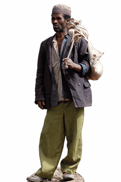 Ein äthiopischer Feldarbeiter steht mit Sack und Pack auf dem Feld.